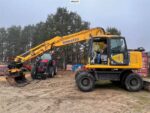 Komatsu PW130-7K con due benne e inclinazione del rotore - immagine 2